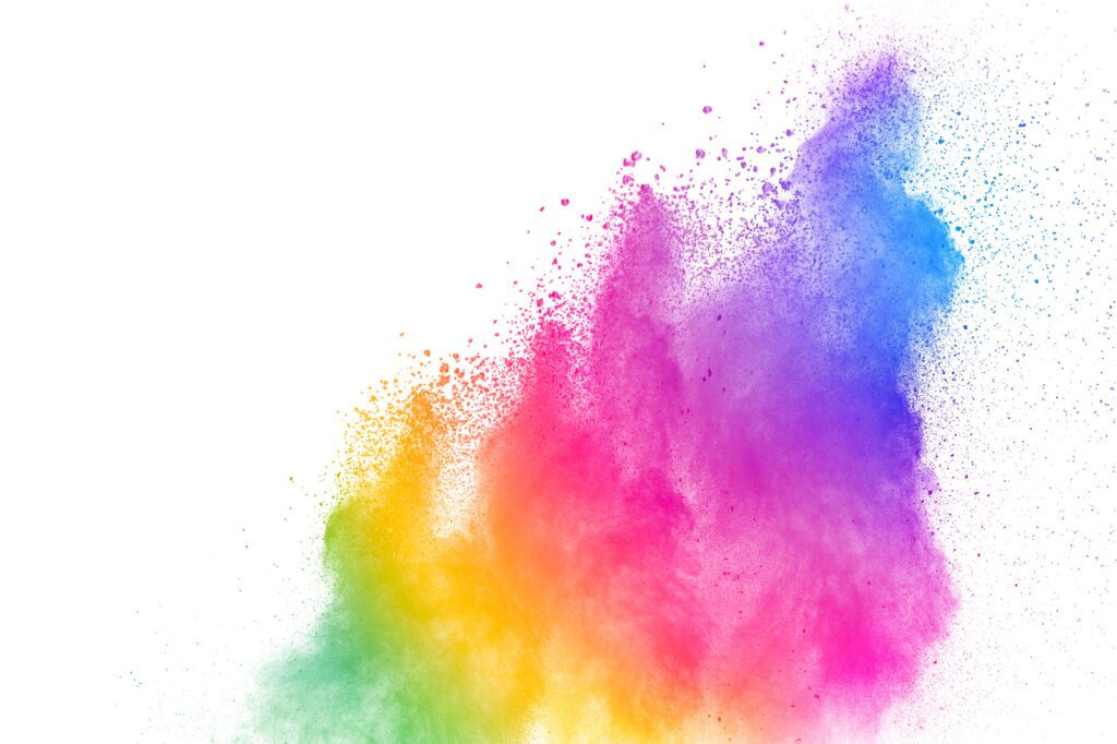 Abstract multi color powder explosion on white background