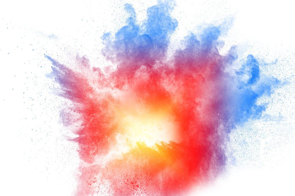 Abstract multicolored powder explosion on white background
